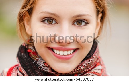 Portrait of beautiful charming smiling woman