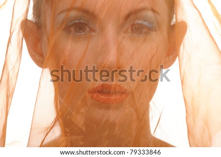 Young beautiful woman with wedding veil, isolated on white background.