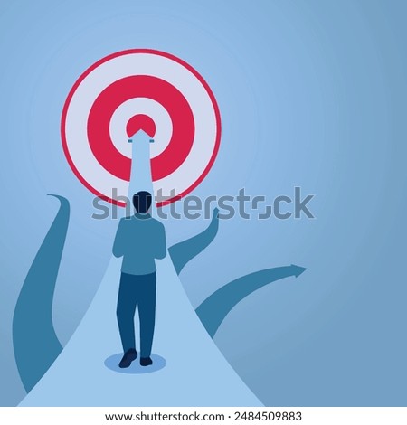 A man walks straight forward towards a target even though the road forks, an illustration of focus.