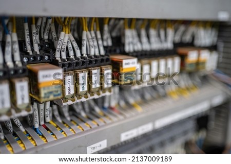 Control panel with circuit breakers, fuses, rails, wiring in the distribution board. Power electric in electrical cabinet control. Electricity and electrical maintenance service Photo stock © 