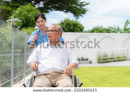 Similar – Image, Stock Photo Young man taking care of his plants on a balcony