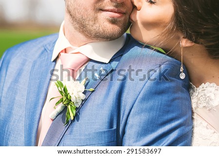 closeup portrait of happy married couple on nature