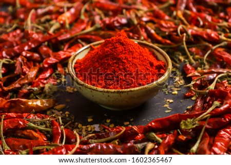 spicy red chilli powder with super chilli background 商業照片 © 