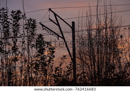 Similar – Foto Bild Traktionsdrähte Ansicht gegen den Himmel. Minimalistisches Bild von diagonalen Drähten.