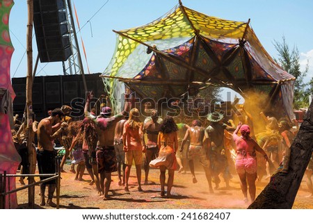 Praia dos Garcez, Ilha de Itaparica, Bahia, Brazil - January 2, 2015: Crowd dancing at electronic music festival Terra Em Transe 2014-2015 at Praia dos Garcez, Itaparica Island, Bahia, Brazil.