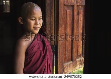 Inle Lake, Myanmar - March 23: Happy novice Buddhist monk at Indein village monastery, Inle Lake, Shan State, Myanmar (Burma).
