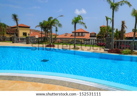 Swimming pool in luxury hotel on coast of Atlantic Ocean, Madeira island, Portugal