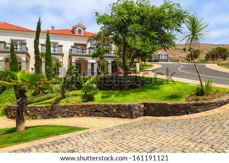 Luxury holiday villa houses palm tree garden street, Madeira island, Portugal