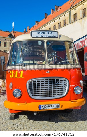 KRAKOW, POLAND - 8 SEP: Red classic bus in depot in Krakow on 8th Sep 2013. These retro style vehicles are kept in a museum \