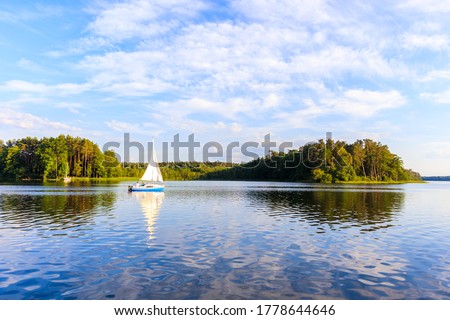 Similar – Image, Stock Photo sailboat on a lake (Geiseltalsee)