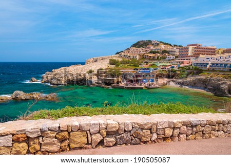 CALA RATJADA, MAJORCA - APR 19: restaurant building and dive club on coast of Majorca island on 19 Apr 2013. Majorca is most visited destination among all Balearic islands.