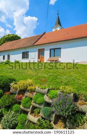 Flowers in garden of a church in spring, Burgenland, southern Austria