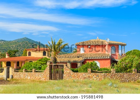 Traditional holiday villa houses on Capo Boi beach, Sardinia island, Italy