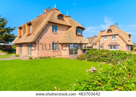 Similar – Foto Bild Rotes Backsteinfriesisches Haus mit Rosenhecke auf der Insel Sylt.