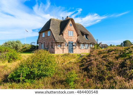 Similar – Foto Bild Rotes Backsteinfriesisches Haus mit Rosenhecke auf der Insel Sylt.