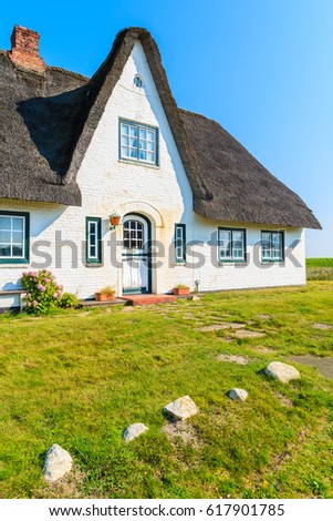 Similar – Foto Bild Rotes Backsteinfriesisches Haus mit Rosenhecke auf der Insel Sylt.