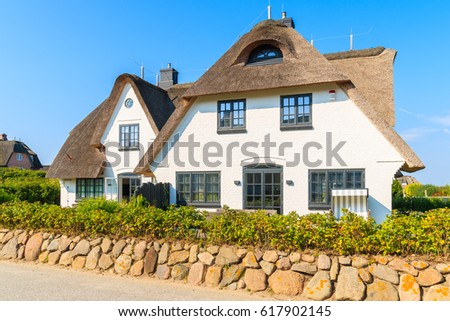 Similar – Foto Bild Rotes Backsteinfriesisches Haus mit Rosenhecke auf der Insel Sylt.