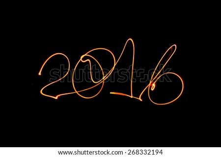Abstract long exposure orange neon lights texture number 2016. New year 2016.