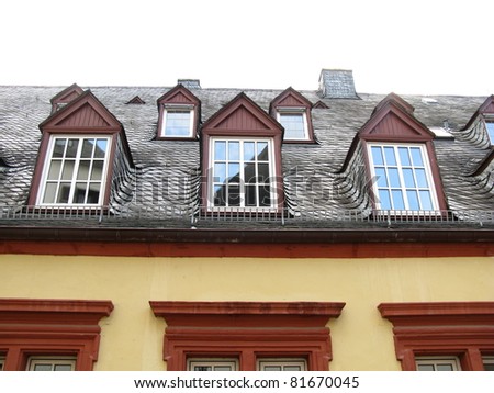 A roof with clay-schists and dormer windows