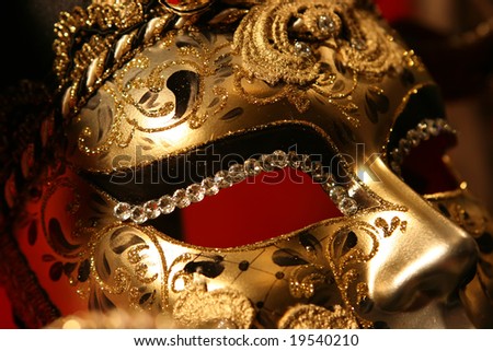 Venetian mask on red background