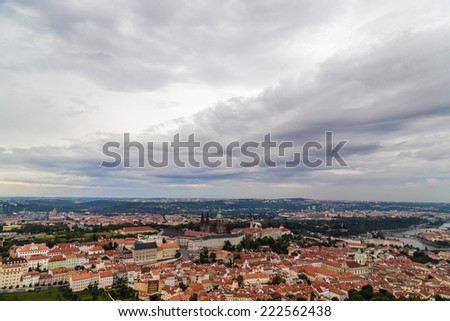 Gloomy day of rain and fog over the red roofs of Prague in the Czech Republic in Central Europe in a view from the tower on Petrin hill.