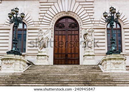 Historical buildings and architecture details in Rome, Italy: the entry door of the Italian Parliament Building