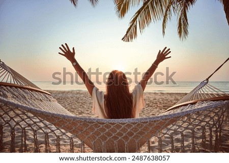 Similar – Image, Stock Photo Tranquil female traveler among palms at seashore