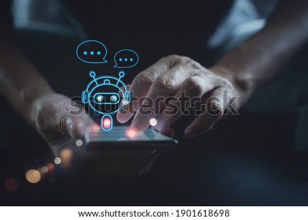 Digital chatbot, robot application, conversation assistant, AI Artificial Intelligence concept. Man using mobile smart phone, with digital chatbot on virtual screen and data in online network