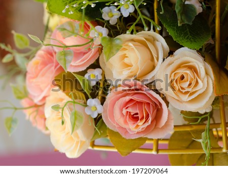 Sweet color of artificial rose bouquet, close up.