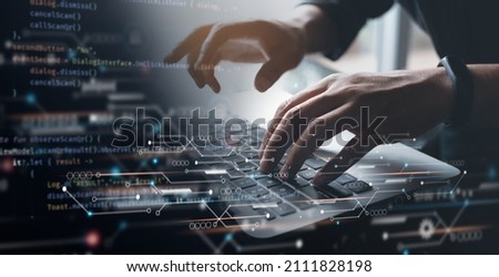 Digital technology, software development concept. Coding programmer, software engineer working on laptop with circuit board and javascript on virtual screen, internet of things IoT Foto d'archivio © 