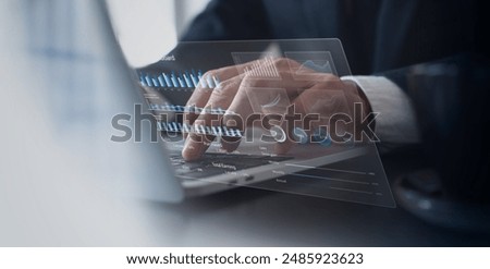 Businessman using laptop computer analyzing sales data and financial growth graph chart report. Business planning, strategy and development. Financial accounting. market research, data analysis