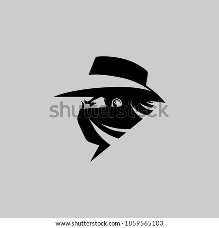Cowboy masked outlaw side view portrait symbol on gray backdrop. Design element Foto d'archivio © 