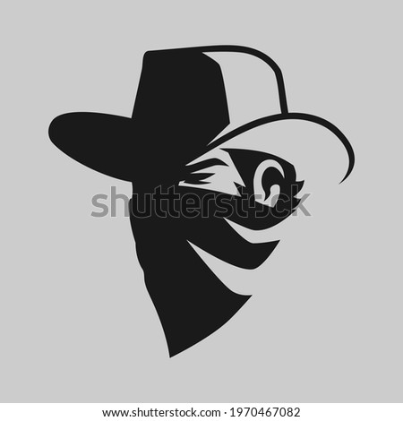 Cowboy masked outlaw portrait symbol on gray backdrop. Design element Foto d'archivio © 