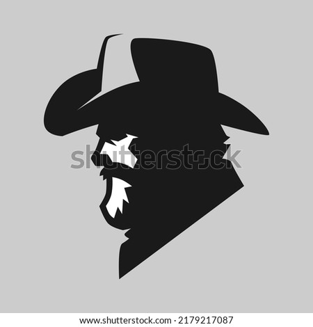 Bearded cowboy portrait side view symbol on gray backdrop. Design element