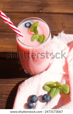 Similar – Image, Stock Photo Strawberry drink close-up. Sweet fruity cocktail