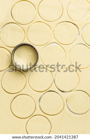 Similar – Image, Stock Photo Dough rolled out on a green background. Homemade pie crust and rolling pin. Baking concept
