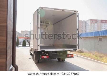 Similar – Image, Stock Photo White trailer on empty road between fields with vegetation