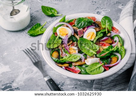 Similar – Image, Stock Photo Spinach salad with eggs avocados tomatoes and mozzarella cheese