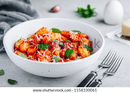 Similar – Foto Bild Gnocchi mit Tomatensauce und Parmigiano auf einem Teller.