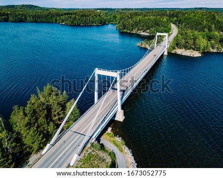 Similar – Image, Stock Photo Truck on suspension bridge over river