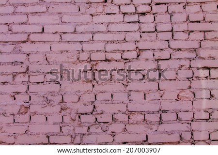 old purple brick wall as background