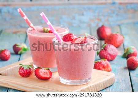 Similar – Image, Stock Photo Strawberry smoothie. Two glasses of berry slush. Summer cold drink