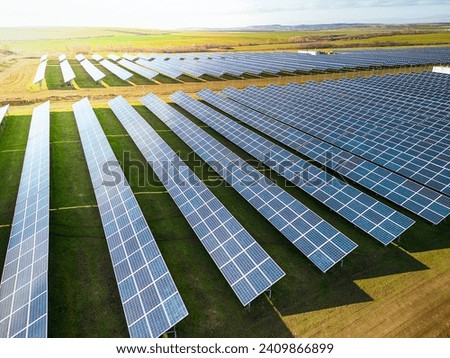 Similar – Foto Bild Erzeugung von Solarstrom. Photovoltaikanlage auf dem Lande. Bewölkter Himmel, Spanien