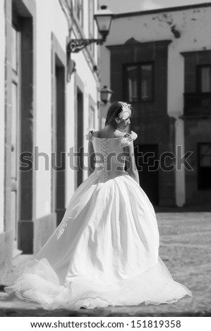 black and white bride in a town