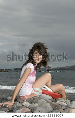 pretty surfer girl waiting for waves