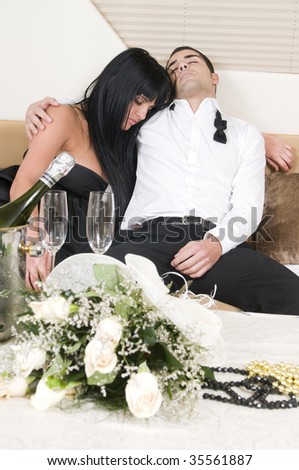 couple sleeping tired after new year party