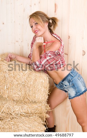 country woman in a  barn