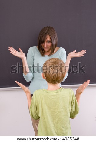 A teacher and student showing they have a question.