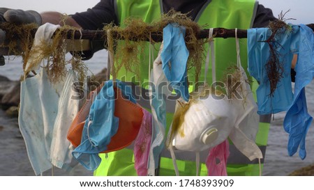 Similar – Image, Stock Photo Coronavirus.pile of medical face masks. Covid 19 concept