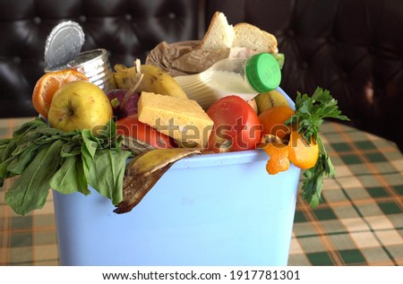 Uneaten spoiled vegetables are thrown in the trash. Food Loss and Food Waste. Reducing Wasted Food At Home